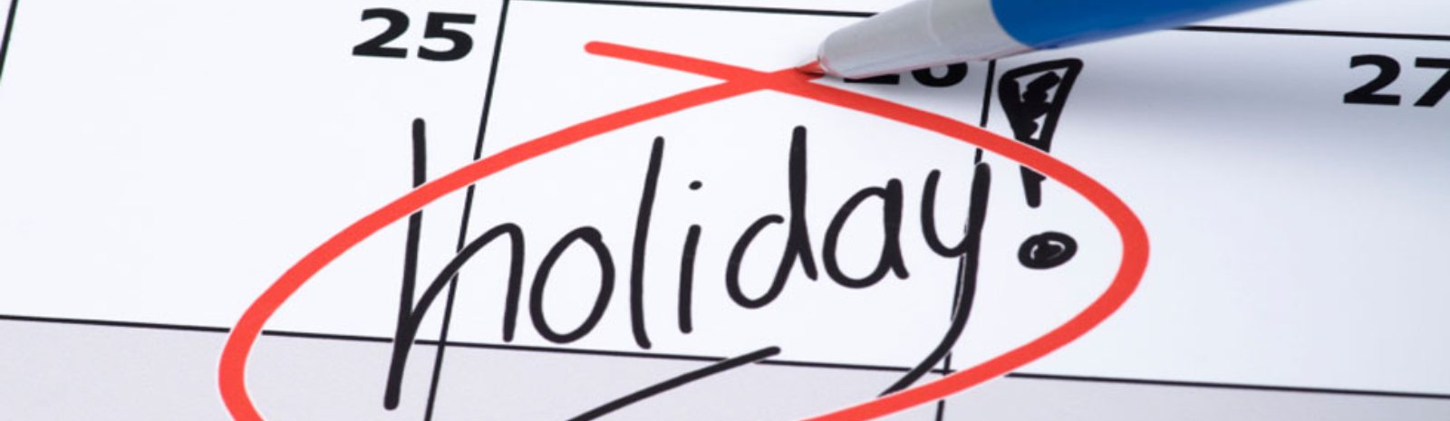 the word holiday circled on a calendar