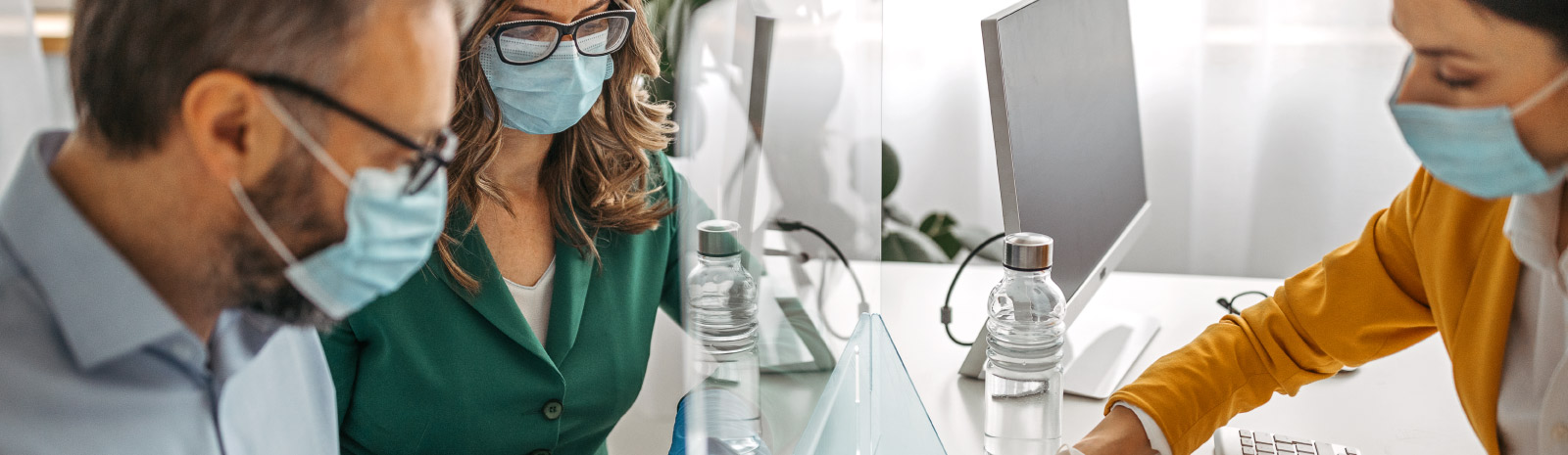 Couple meets for an appointment where all are wearing masks.
