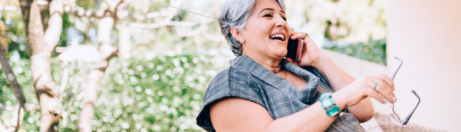 mature woman talking on a phone