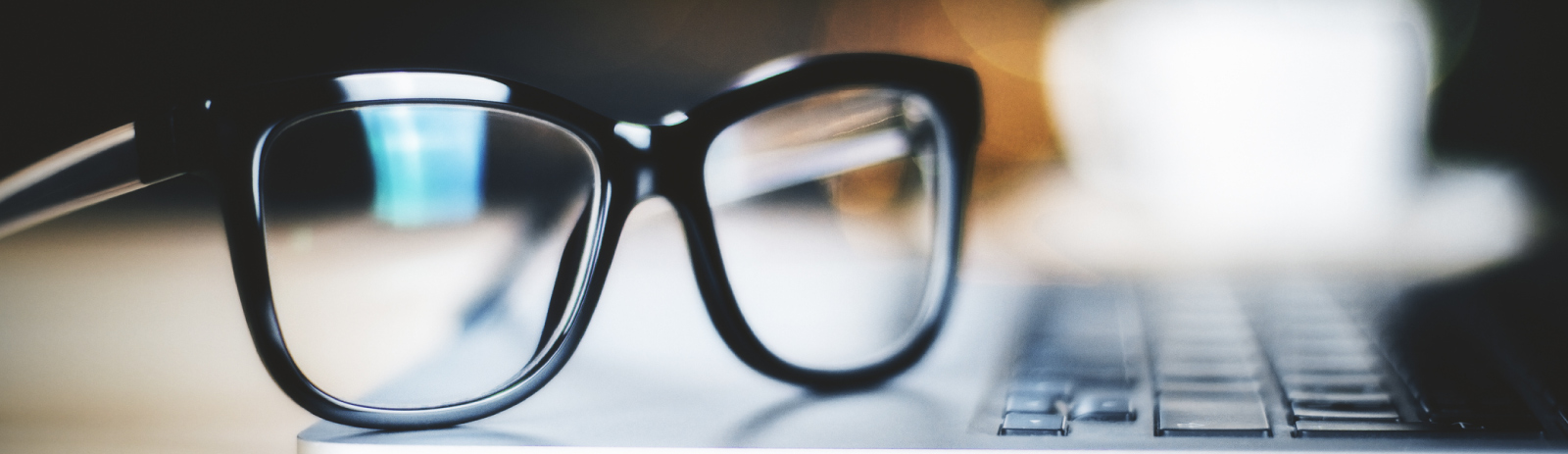 eyeglasses on a laptop computer