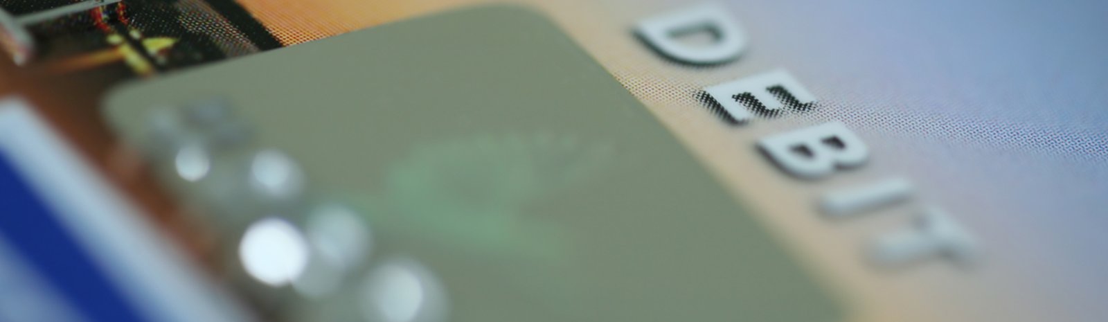 image of the word Debit on a debit card